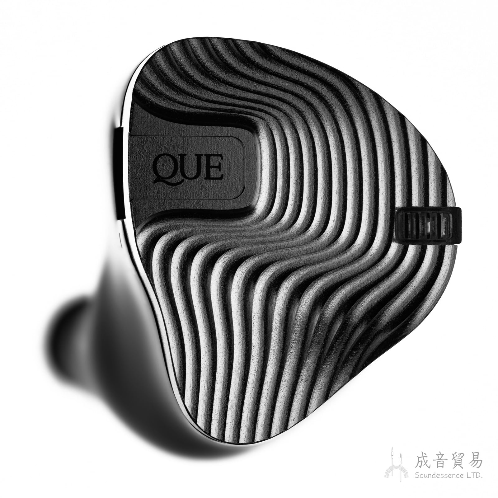 Yu9 Que hybrid in-ear monitor with wave-pattern metal faceplate